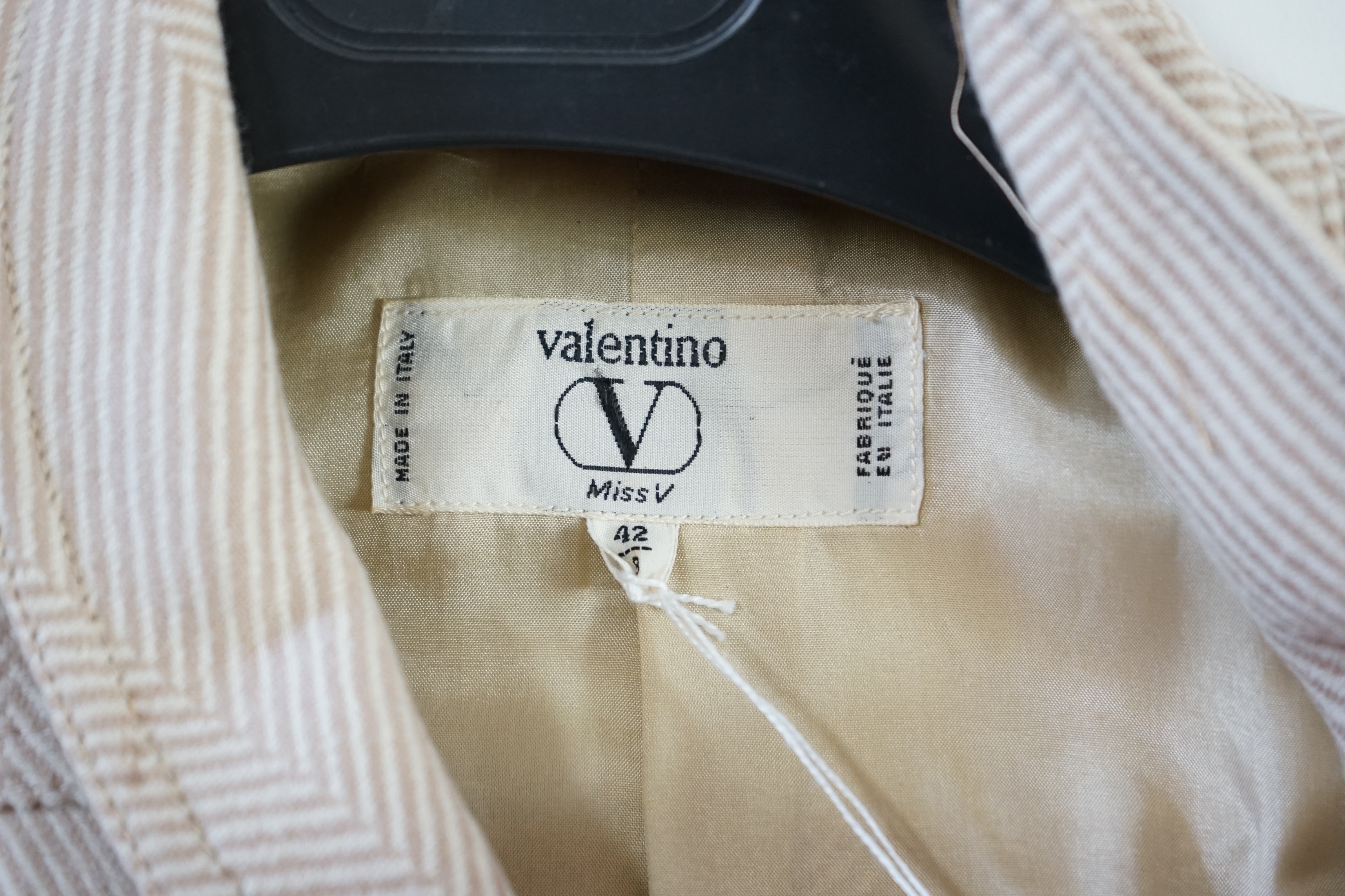 Two lady's Valentino Jackets and a trouser suit. Proceeds to Happy Paws Puppy Rescue